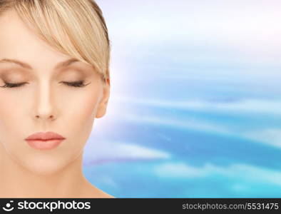 health and beauty concept - face of beautiful woman with blonde hair