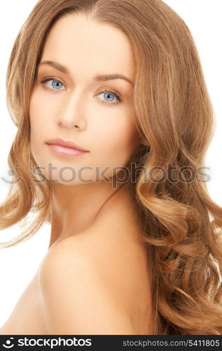 health and beauty concept - face of beautiful woman with long hair