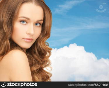 health and beauty concept - face of beautiful woman with long hair