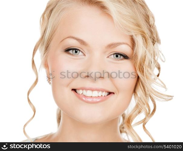 health and beauty concept - face of happy woman with curly hair