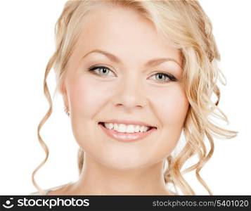 health and beauty concept - face of happy woman with curly hair