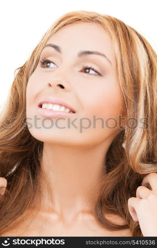 health and beauty concept - face of happy woman with long hair