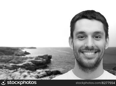 health and beauty concept - portrait of smiling young handsome man