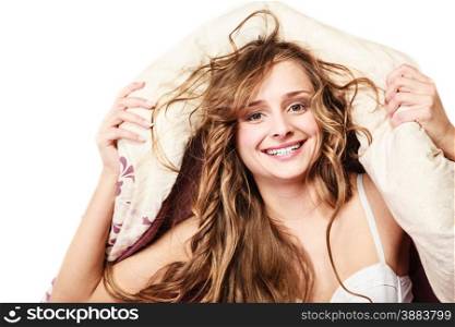 Health and beauty concept. woman lying on mattress underneath the quilt and smiling, Girl relaxing on her bed at morning