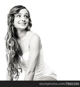 Health and beauty concept. Young lovely woman long curly hair portrait, black white photo