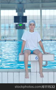 health and fitness lifestyle concept with young athlete swimmer recreating on indoor olimpic pool