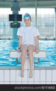 health and fitness lifestyle concept with young athlete swimmer recreating on indoor olimpic pool