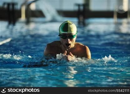health and fitness lifestyle concept with young athlete swimmer recreating on olimpic pool