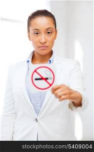 health and healthcare concept - picture of african woman with restriction no smoking sign