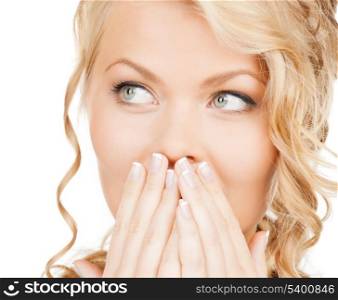 health, beauty, business concept - face of beautiful woman covering her mouth