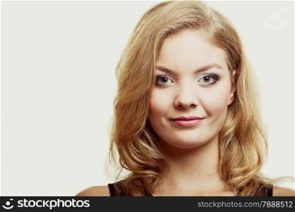 Health beauty concept - portrait beautiful woman face with makeup and long blond hair