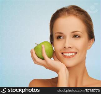 health, beauty, vegetarian food and people concept - smiling young woman with green apple
