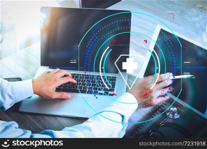 Health care and medical services with circular AR diagram.Medicine doctor hand working with modern digital tablet and laptop computer with smart phone as medical network concept