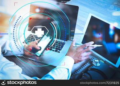 Health care and medical services with circular AR diagram.Medicine doctor hand working with modern digital tablet and laptop computer with smart phone as medical network concept