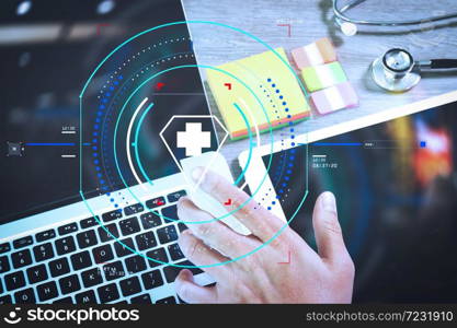 Health care and medical services with circular AR diagram.Medical network technology concept. Doctor hand working with stethoscope and laptop computer digital tablet