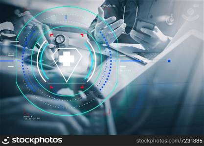 Health care and medical services with circular AR diagram.Medical technology network team meeting concept. Doctor hand working smart phone modern digital tablet dock keyboard