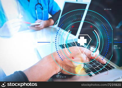 Health care and medical services with circular AR diagram.Medical technology network team meeting concept. Doctor hand working with smart phone modern digital tablet and laptop computer