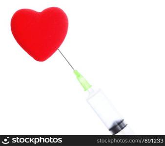 Health care and medical theme - syringe and red heart isolated on white
