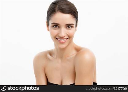 Health care and spa concept - attractive young and healthy woman with nude makeup on white background. Health care and spa concept - attractive young and healthy woman with nude makeup on white background.