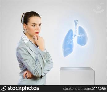 Health care. Image of scientist looking at media icon. Therapy