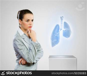 Health care. Image of scientist looking at media icon. Therapy