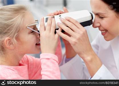 health care, medicine, people, eyesight and technology concept - optometrist with pupilometer checking patient intraocular pressure at eye clinic or optics store