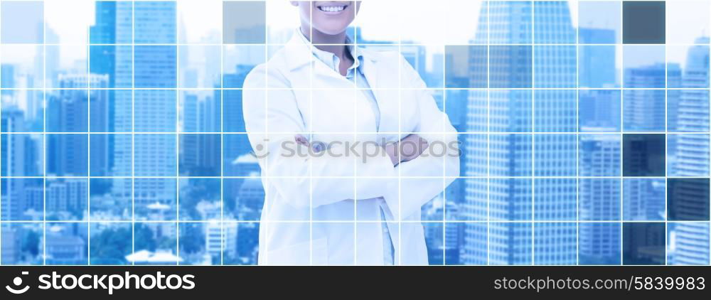 health care, science, people and medical concept - happy african american female doctor in white coat over city and blue monochrome grid background