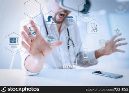 Health care system diagram with health check and symptom on VR dashboard.smart doctor wearing virtual reality goggles in modern office with mobile phone using with VR headset