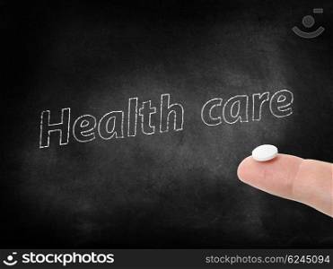 Health care written on a blackboard