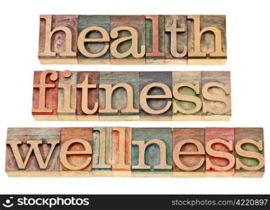 health, fitness, wellness - healthy lifestyle concept - isolated text in vintage letterpress wood type