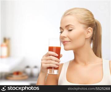 health, food and diet concept - close up of young woman drinking tomato juice