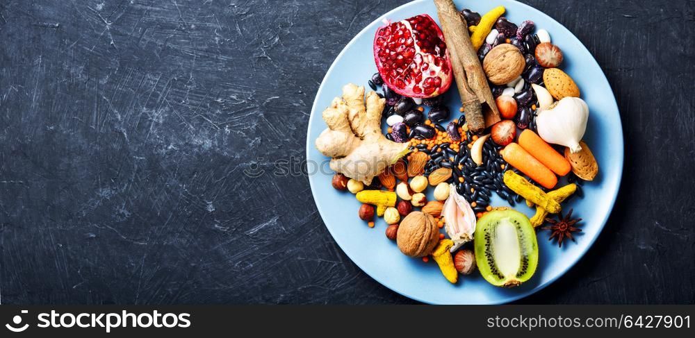 Health food concept. Healthy eating food concept with nut, spice, vegetables and fruit