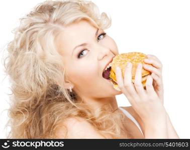 health, food, diet and beauty concept - beautiful happy woman with burger