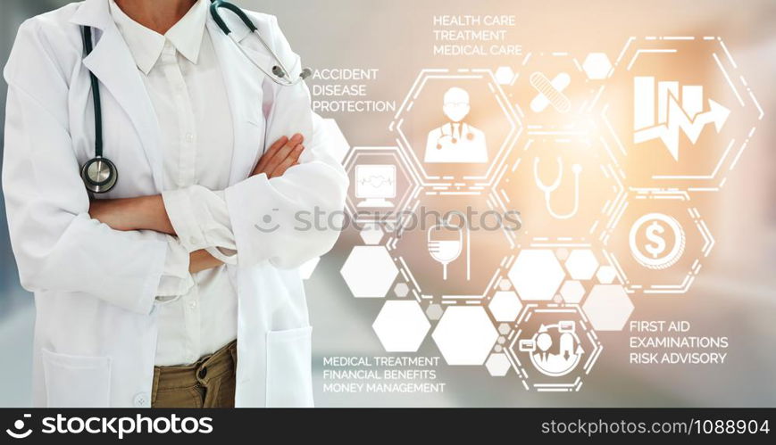 Health Insurance Concept - Doctor in hospital with health insurance related icon graphic interface showing healthcare people, money planning, risk management, medical treatment and coverage benefit.