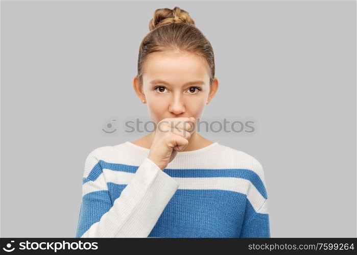 health, medicine and people concept - sick coughing teenage girl in pullover over grey background. sick coughing teenage girl in pullover