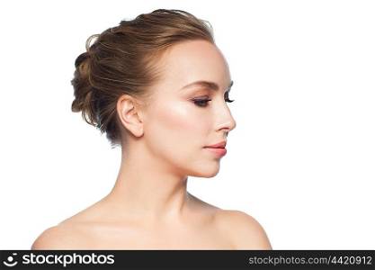 health, people, plastic surgery and beauty concept - beautiful young woman face over white background