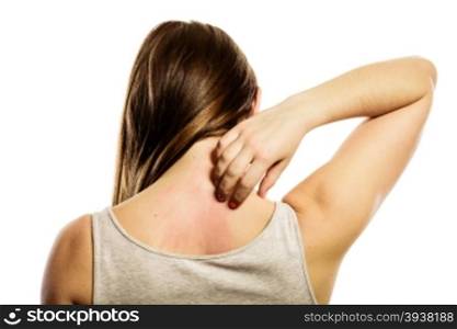 Health problem. Young woman scratching her itchy back with allergy rash isolated on white