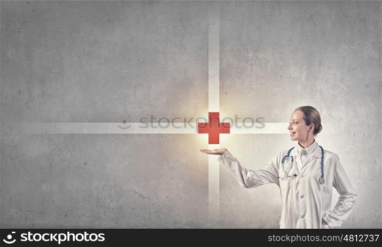 Health protection. Close up of doctor hands with medicine cross sign