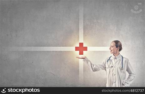 Health protection. Close up of doctor hands with medicine cross sign