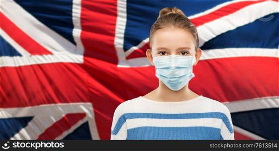health protection, safety and pandemic concept - teenage girl in protective medical mask over flag of united kingdom background. teenage girl in mask over flag of united kingdom