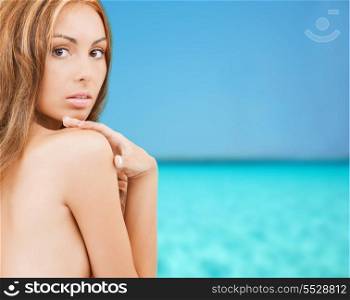 health, relaxation and beauty concept - beautiful topless woman