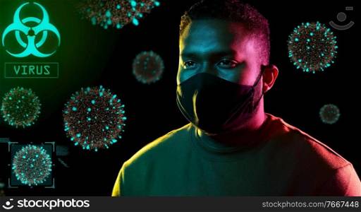 health, safety and pandemic concept - young african american man wearing reusable protective mask over coronavirus virions on black background. african american man wearing black reusable mask