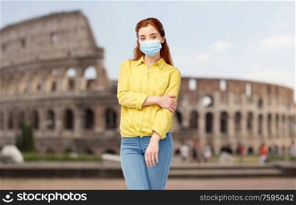 health, safety and pandemic concept - young woman wearing protective medical mask for protection from virus disease over coliseum in rome, italy background. young woman in protective medical mask