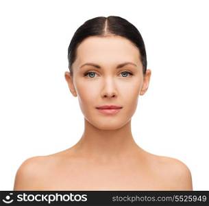 health, spa and beauty concept - clean face of beautiful young woman