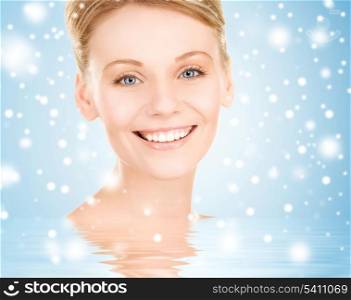 health, spa, beauty concept - face of happy beautiful woman