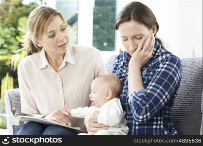 Health Visitor With New Mother Suffering With Depression