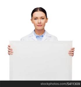 healthcare, advertisement and medicine concept - calm female doctor with white blank board