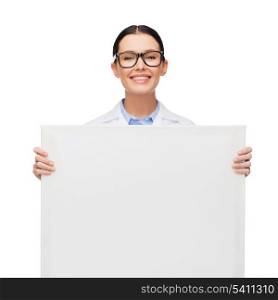 healthcare, advertisement and medicine concept - smiling female doctor in eyeglasses with white blank board