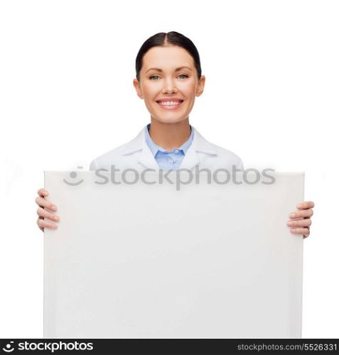 healthcare, advertisement and medicine concept - smiling female doctor with white blank board