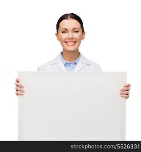 healthcare, advertisement and medicine concept - smiling female doctor with white blank board